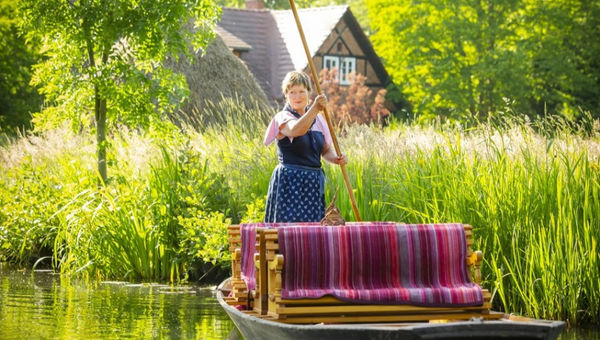 Manuela Filko, a lifelong Lehde resident, has guided Spreewald boat tours for 25 years, sharing regional stories and traditions.